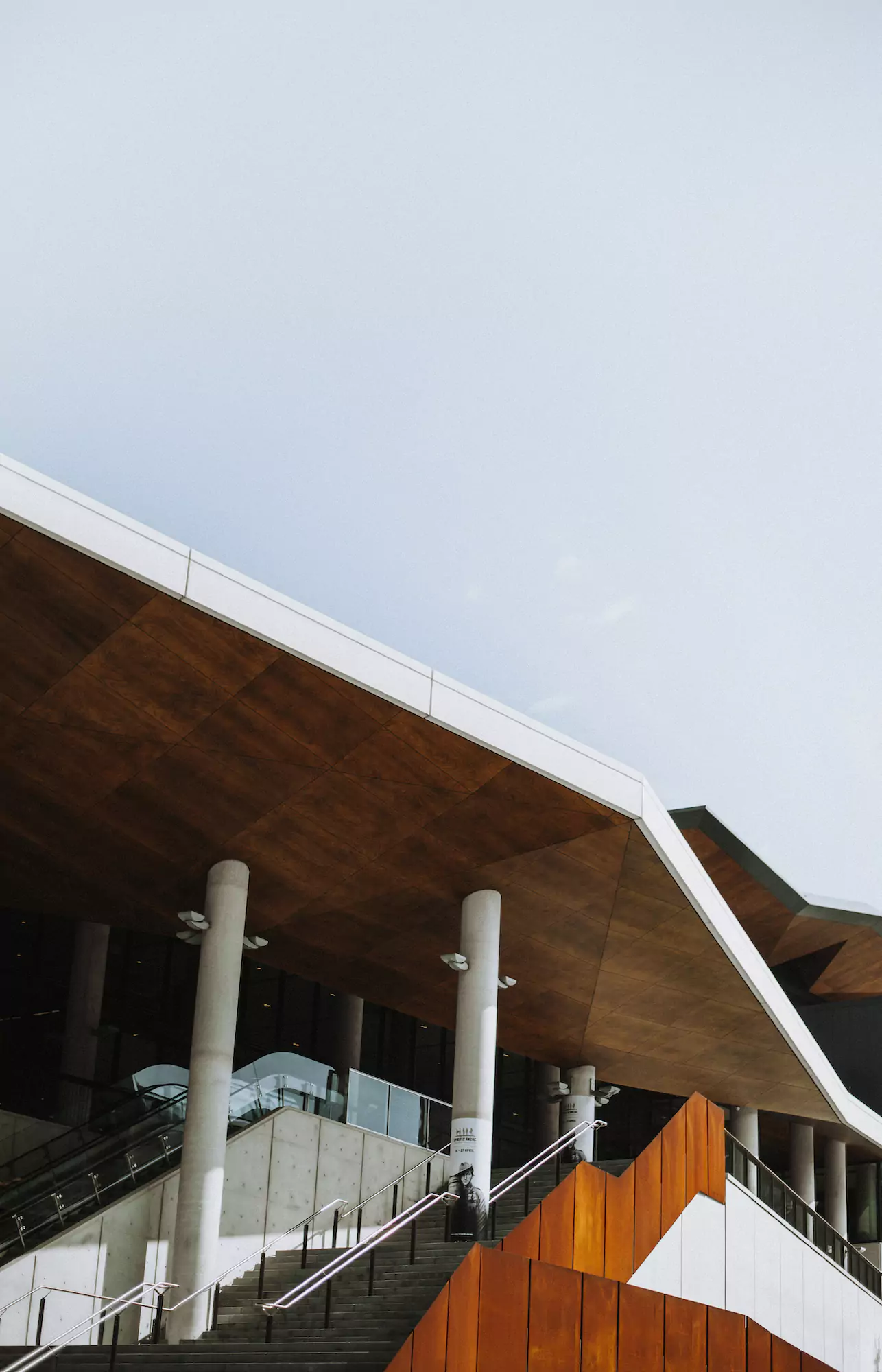 An empty staircase under an angular roof in Darling Harbour, Sydney, Australia